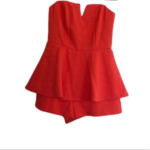 Coral/ Orange Impressions Boutique Peplum Romper  NWT size medium
